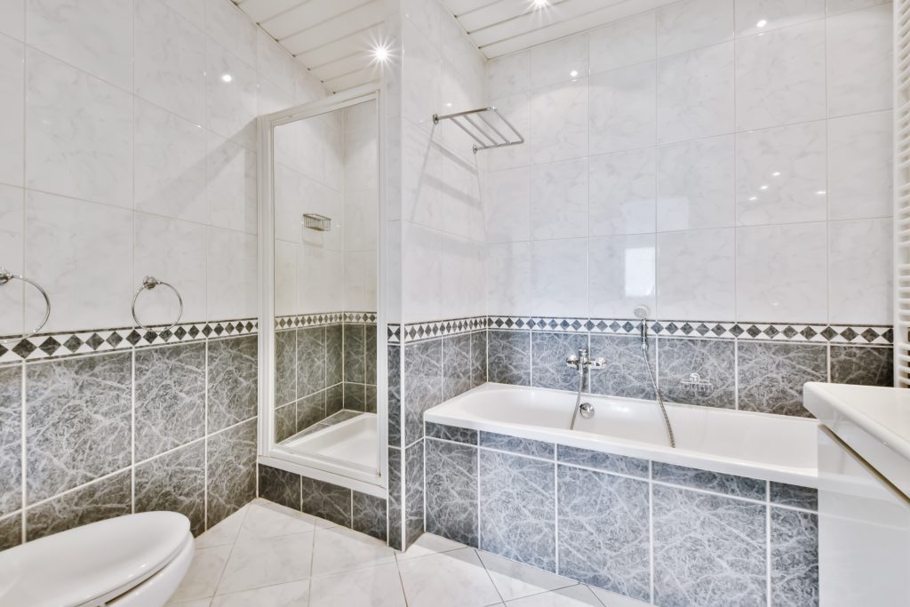 bright bathroom with blue tiled floor 2023 11 27 05 22 04 utc